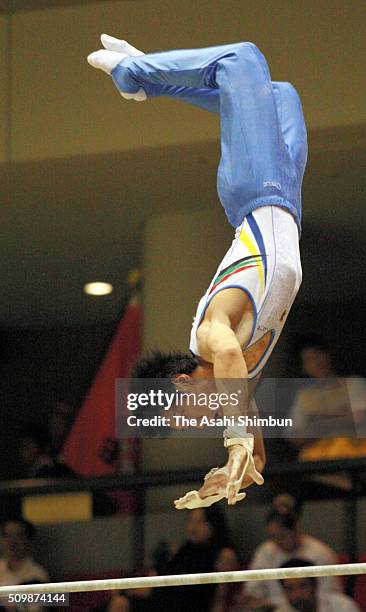 Hisashi Mizutori competes in the High Bar during the Artistic Gymnastics All Japan Championship at the Amagasaki City Memorial Park Gymnasium on...