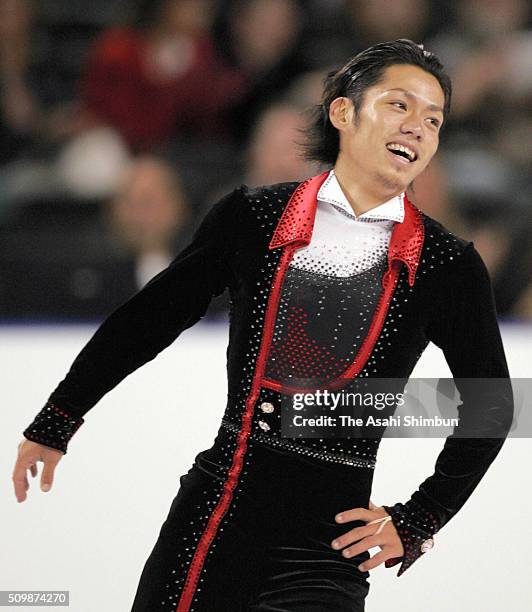 Daisuke Takahashi of Japan reacts after competing in the Men's Singles Short Program during day one of the Skate America at the Boardwalk Hall on...
