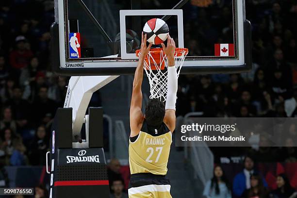 Canadian tennis star Milos Raonic almost has a dunk near the end of the half. NBA all star Celebrity game is 1st half action at Ricoh Coliseum, all...
