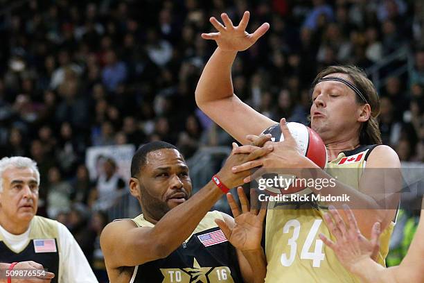 Win Butler defends against USA's Anthony Anderson. NBA all star Celebrity game is 1st half action at Ricoh Coliseum, all part of the NBA all star...