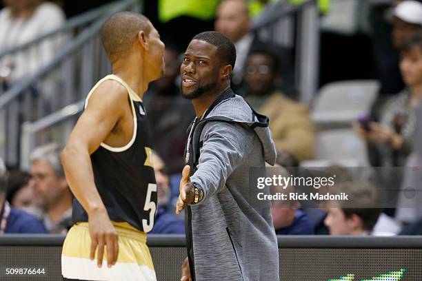 Coach Kevin Hart welcomes back to the bench Buggsy Bogues. NBA all star Celebrity game is 1st half action at Ricoh Coliseum, all part of the NBA all...