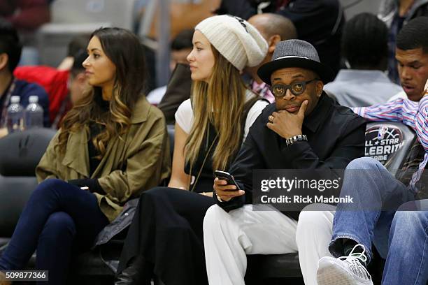 Film maker Spike Lee, courtside, seated beside Olivia Wilde. NBA all star Celebrity game is 1st half action at Ricoh Coliseum, all part of the NBA...