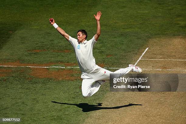 Trent Boult of New Zealand takes a catch off his own bowling to dismiss Mitch Marsh of Australia during day two of the Test match between New Zealand...