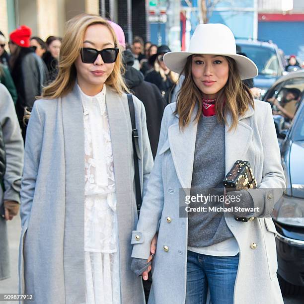 Dani Song and Aimee Song are seen in outside the Zimmermann 2016 fashion show on February 12, 2016 in New York City.