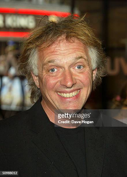 Comedian Rik Mayall arrives at the UK Premiere of the classic novel by Jules Verne, "Around The World In 80 Days" on June 22, 2004 at Vue West End,...