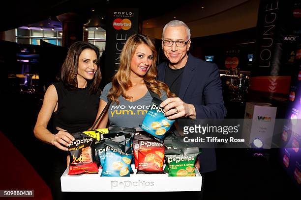 Dr. Emily Morse, guest and Dr. Drew at popchips and Westwood One's Backstage at The GRAMMYS at Staples Center on February 12, 2016 in Los Angeles,...