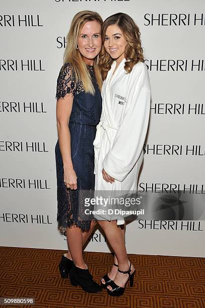 Television personalities Korie Robertson and Sadie Robertson attend the Sherri Hill Fall 2016 fashion show during New York Fashion Week: The Shows on...