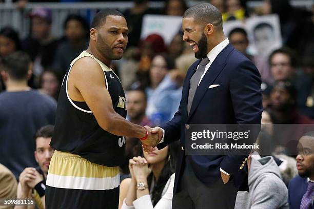 Actor Anthony Anderson stops mid game to chat with, and introduce himself, to Canada coach Drake. NBA all star Celebrity game is 2nd half action at...