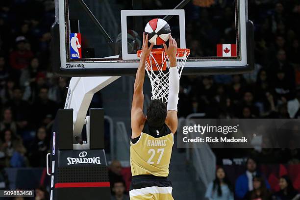 Canadian tennis star Milos Raonic almost has a dunk near the end of the half. NBA all star Celebrity game is 1st half action at Ricoh Coliseum, all...