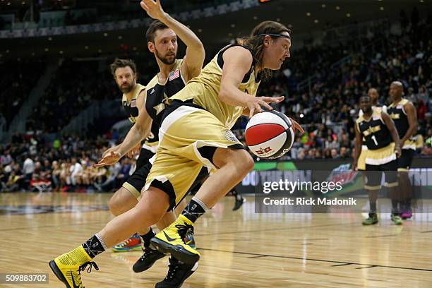 Win Butler turns the baseline and heads to the hoop. NBA all star Celebrity game is 2nd half action at Ricoh Coliseum, all part of the NBA all star...