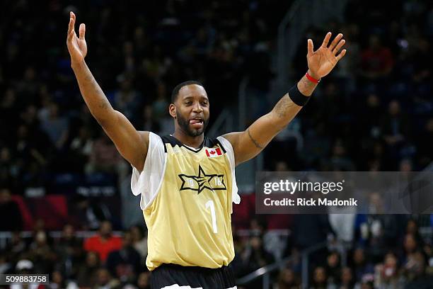 Canada' Tracy McGrady celebrates a 3. NBA all star Celebrity game is 2nd half action at Ricoh Coliseum, all part of the NBA all star weekend...