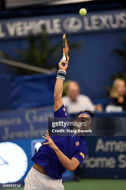 Kei Nishikori of Japan serves to Mikhail Kukushkin of Kazakhstan during their quarterfinal singles match on Day 5 of the Memphis Open at the Racquet...