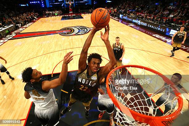 Andrew Wiggins of the Minnesota Timberwolves and World team goes up for a dunk in the second half against Jahlil Okafor of the Philadelphia Sixers...