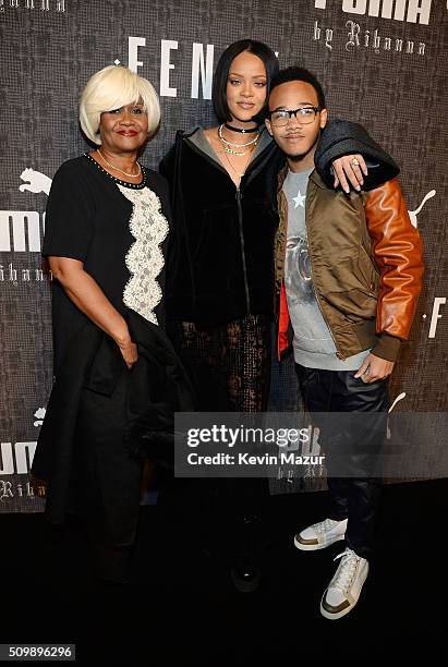 Monica Braithwaite, Rihanna and Rajad Fenty attend the FENTY PUMA by Rihanna AW16 Collection during Fall 2016 New York Fashion Week at 23 Wall Street...