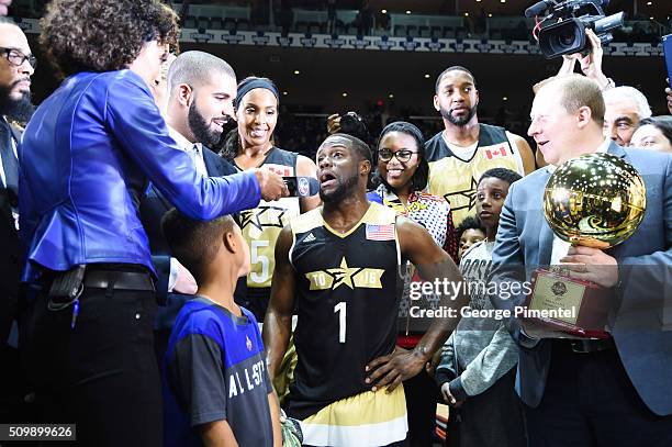 Drake and Kevin Hart attend the 2016 NBA All-Star Celebrity Game at Ricoh Coliseum on February 12, 2016 in Toronto, Canada.