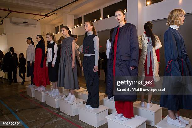 Models pose at the Damnsel 'Garmeoplasty' presentation during Fall 2016 New York Fashion Week on February 12, 2016 in New York City.