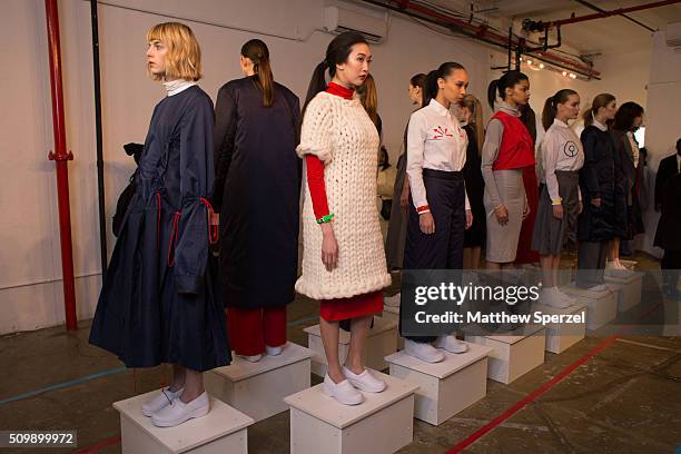 Models pose at the Damnsel 'Garmeoplasty' presentation during Fall 2016 New York Fashion Week on February 12, 2016 in New York City.