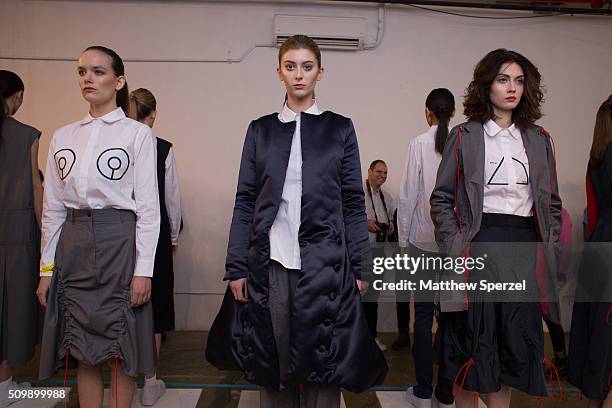 Models pose at the Damnsel 'Garmeoplasty' presentation during Fall 2016 New York Fashion Week on February 12, 2016 in New York City.