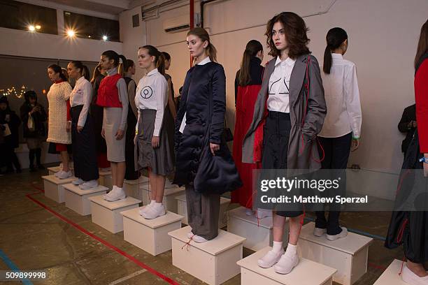 Models pose at the Damnsel 'Garmeoplasty' presentation during Fall 2016 New York Fashion Week on February 12, 2016 in New York City.