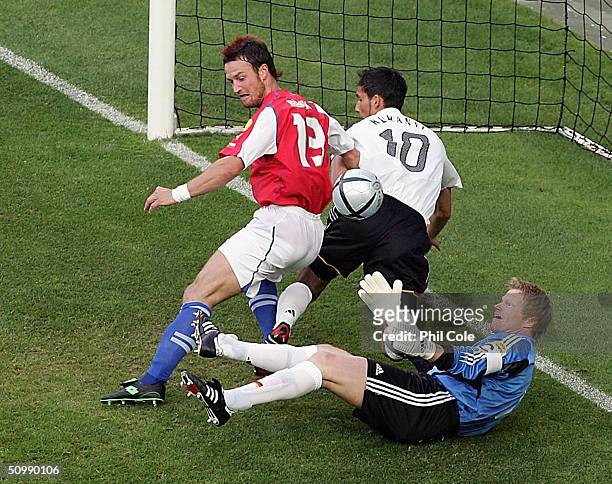 Martin Jiranek of the Czech Republic has his shot blocked by Oliver Kahn of Germany during the UEFA Euro 2004 Group D match between Germany and Czech...