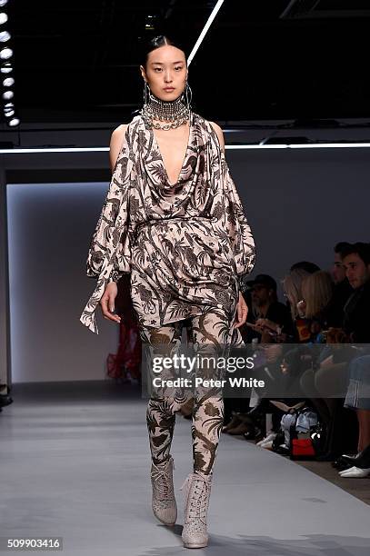 Model walks the runway at the Zimmermann fashion show during Fall 2016 New York Fashion Week at Art Beam on February 12, 2016 in New York City.