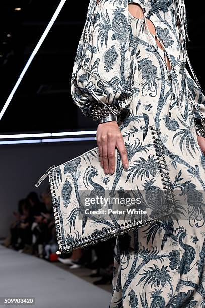 Model, clutch detail, walks the runway at the Zimmermann fashion show during Fall 2016 New York Fashion Week at Art Beam on February 12, 2016 in New...