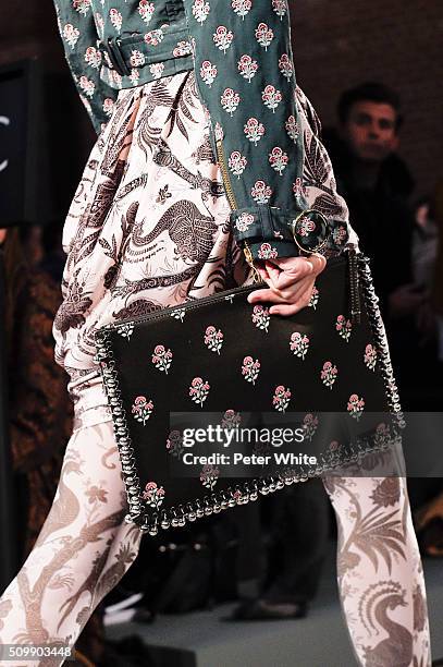 Model, clutch detail, walks the runway at the Zimmermann fashion show during Fall 2016 New York Fashion Week at Art Beam on February 12, 2016 in New...