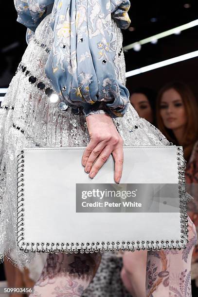 Model, clutch detail, walks the runway at the Zimmermann fashion show during Fall 2016 New York Fashion Week at Art Beam on February 12, 2016 in New...