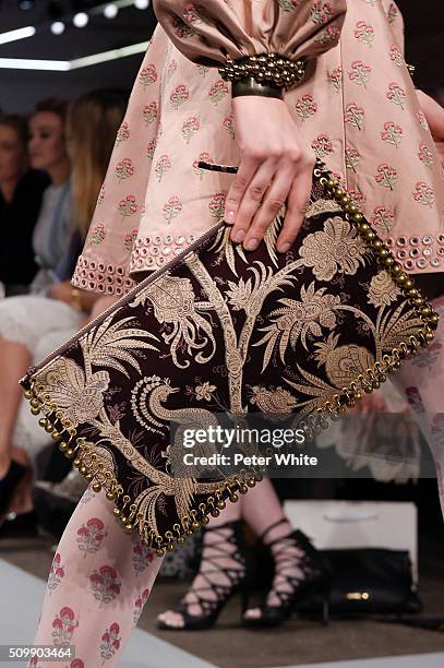 Model, clutch detail, walks the runway at the Zimmermann fashion show during Fall 2016 New York Fashion Week at Art Beam on February 12, 2016 in New...
