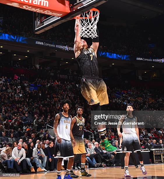 Dwight Powell of the World Team dunks the ball during the BBVA Compass Rising Stars Challenge as part of the 2016 NBA All Star Weekend on February...