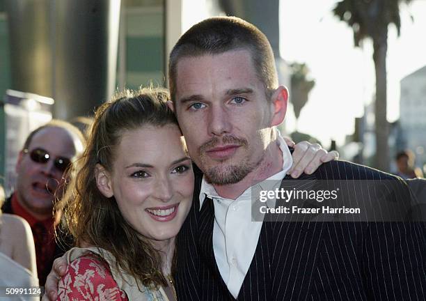 Actress Winona Ryder greets Actor Ethan Hawke at the Los Angeles Film Festival Premiere of "Before Sunset" at the Archlight Cinema on June 23, 2004...