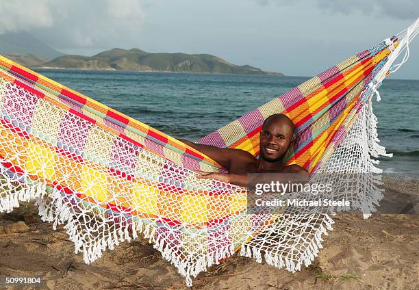 Kim Collins, 100m sprinter of St Kitts and Nevis and Olympic contender for Athens at home on April 21, 2004 in Frigate Bay, St.Kitts and Nevis.