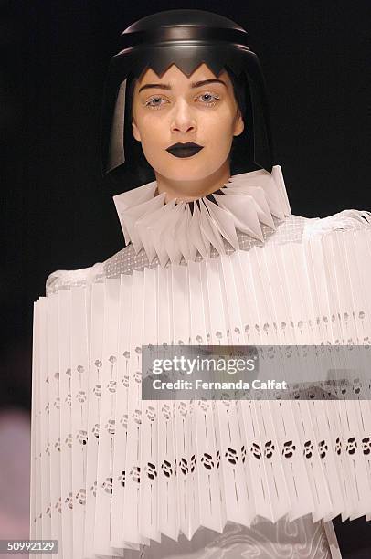 Model walks the runway at the Jum Nakao 2005 Spring/Summer collection during the Sao Paulo Fashion Week June 17, 2004 in Sao Paulo, Brazil.