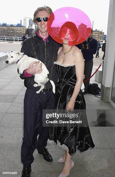 Phillip Treacey and Isabella Blow attend the "When Phillip met Isabella" Exhibition featuring a range of Phillip Treacey Hats designed for Isabella...