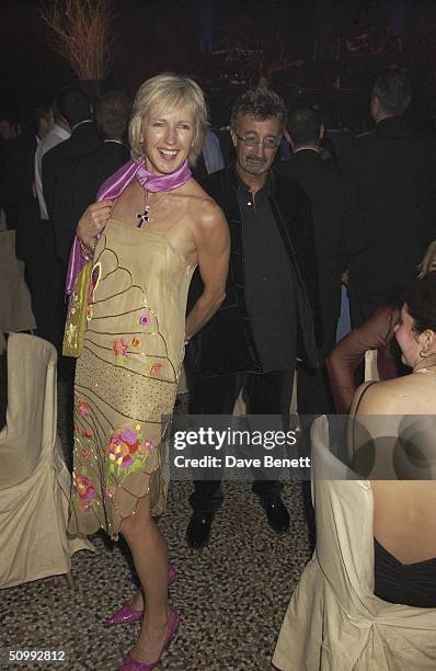 Marie and Eddie Jordan attend the Grand Prix Ball in aid of the Cantor Index Fund at The Natural History Museum on December 13, 2002 in London.