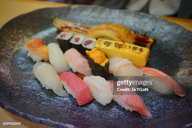 sushi - tsukiji fish market stock pictures, royalty-free photos & images