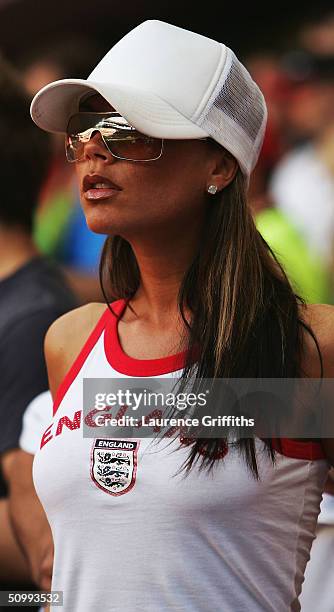 Victoria Beckham looks out to the pitch for husband David Beckham during the UEFA Euro 2004, Quarter Final match between Portugal and England at the...