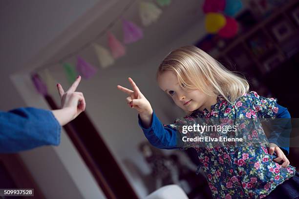 children making peace sign - kid middle finger imagens e fotografias de stock