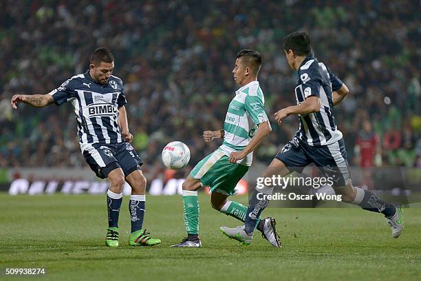 Walter Gargano of Monterrey and Nestor Calderon of Santos Laguna fight for the ball during a 6TH round match between Santos Laguna and Monterrey as...