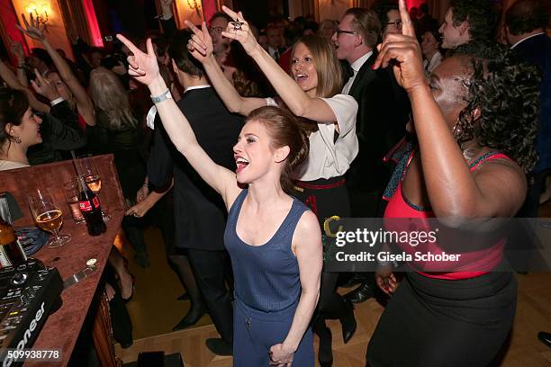 Josefine Preuss and Katrin Berben dance during the Bunte and BMW Festival Night 2016 during the 66th Berlinale International Film Festival Berlin on...