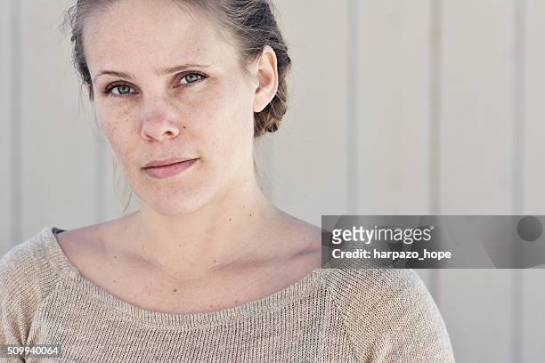 portrait of a woman with a brown sweater. - one woman only 35-40 stock pictures, royalty-free photos & images