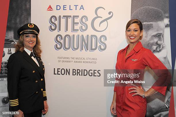 Delta pilot and flight attendent attend Delta Air Lines Toasts GRAMMY Weekend with "Sites and Sounds," A Private Performance and Interactive Evening...