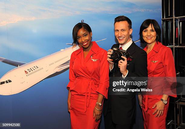 Delta flight attendents and a Delta pilot attend Delta Air Lines Toasts GRAMMY Weekend with "Sites and Sounds," A Private Performance and Interactive...