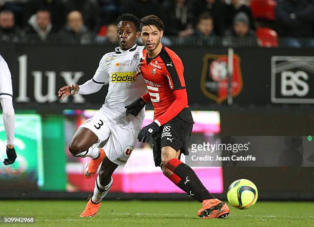 Arnold Bouka Moutou of Angers and Pedro Mendes of Rennes in action during the French Ligue 1 match between Stade Rennais FC and SCO Angers at Roazhon...