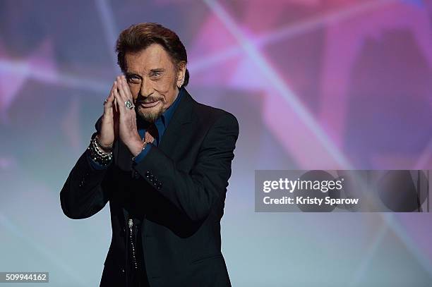 Johnny Hallyday receives the award for Best Singing Album for 'De l'amour' during the 31st 'Victoires de la Musique' French Music Awards Ceremony at...