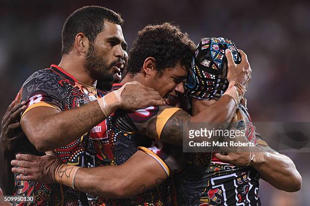 Dane Gagai of the Indigenous All Stars celebrates scoring a try with team mates during the NRL match between the Indigenous All-Stars and the World...