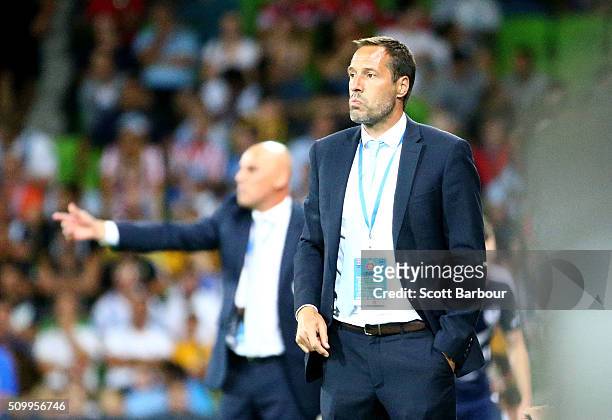 Kevin Muscat , coach of the Victory and John van 't Schip, coach of City FC look on during the round 19 A-League match between Melbourne City FC and...