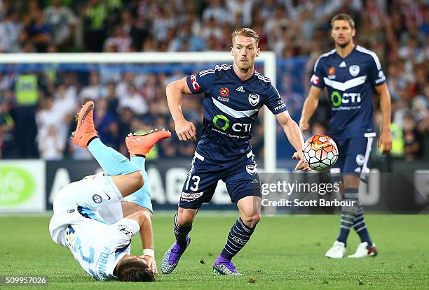 Oliver Bozanic of the Victory and Bruno Fornaroli of City FC compete for the ball during the round 19 A-League match between Melbourne City FC and...