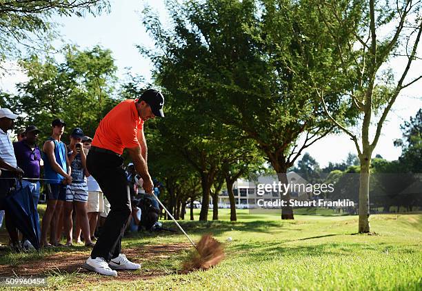 Charl Schwartzel of South Africa plays his approach shot on the 18th hole during the third round of the Tshwane Open at Pretoria Country Club on...