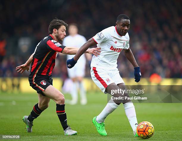 Giannelli Imbula of Stoke City controls the ball under pressure of Harry Arter of Bournemouth during the Barclays Premier League match between A.F.C....